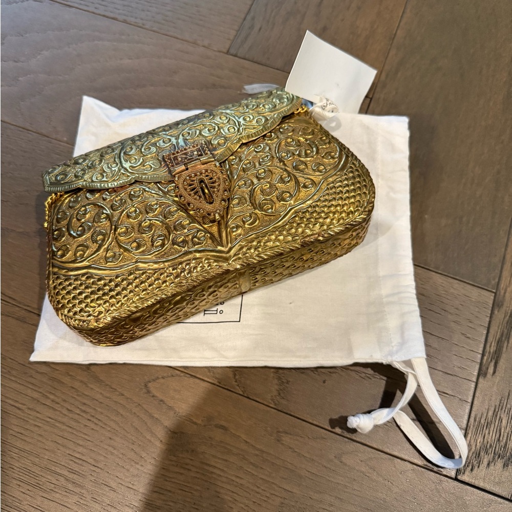 metal embossed gold clutch